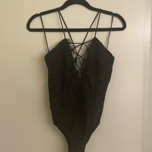 Sexy black lace appliqué body suit! Worn once!